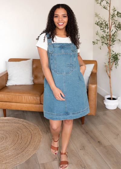 Washed denim overall dress with the front pocket on the bodice