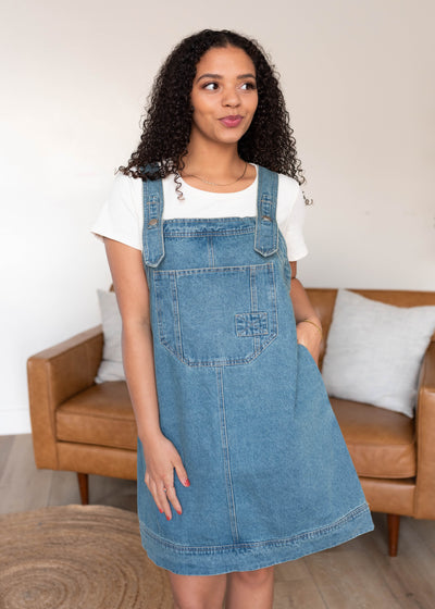 Adjustable straps on the ashed denim overall dress