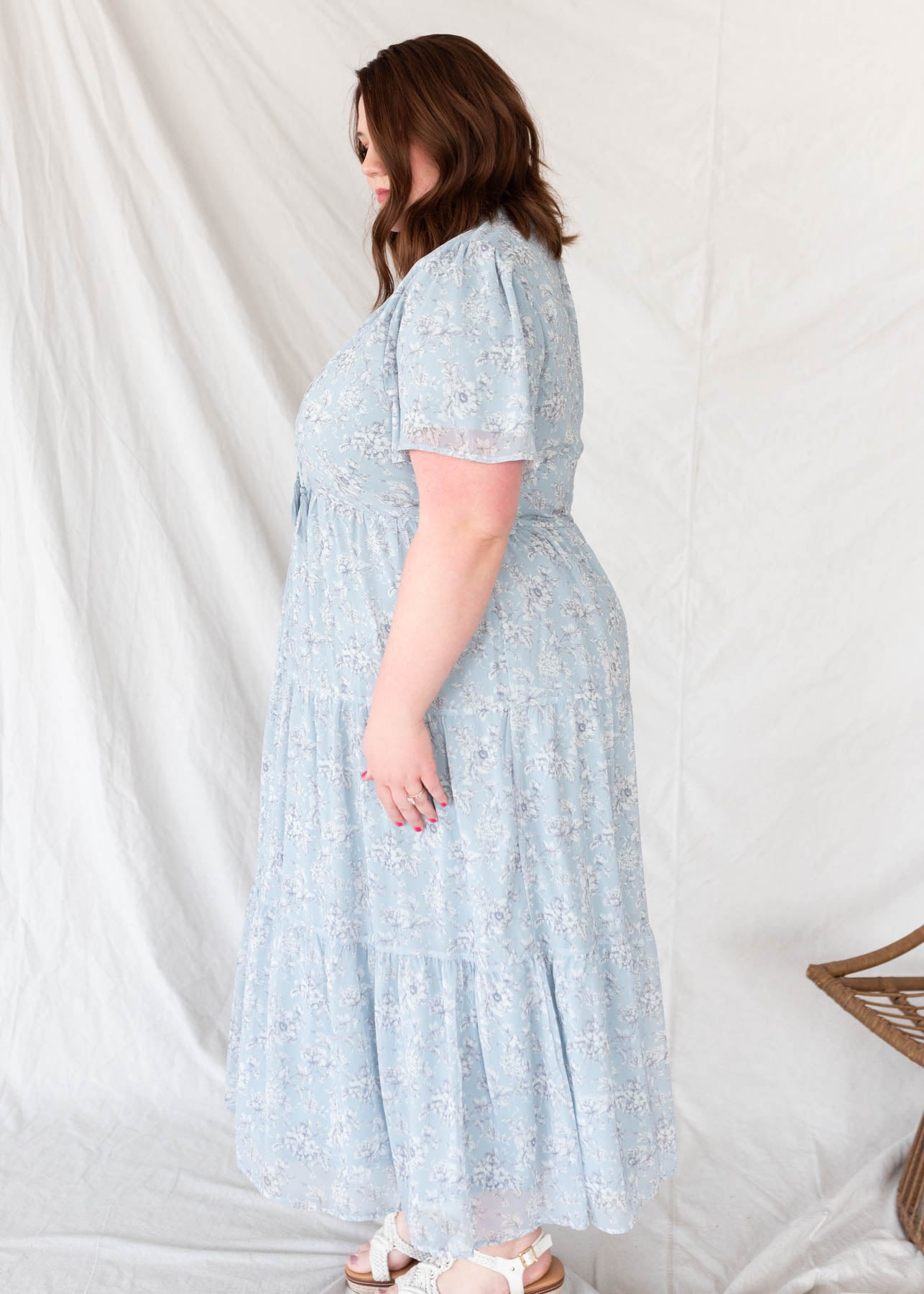 Side view of the plus size light blue floral dress