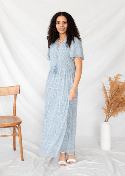 Light blue floral dress with ties at the neck