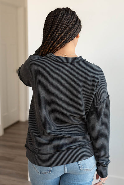 Back view of the charcoal ribbed long sleeve top