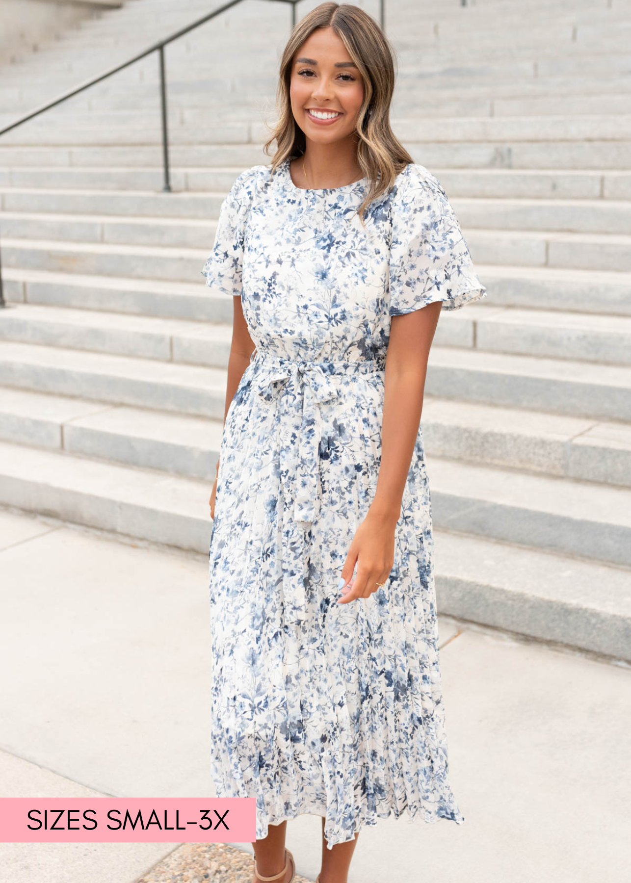 Blue floral pleated dress with flutter sleeves