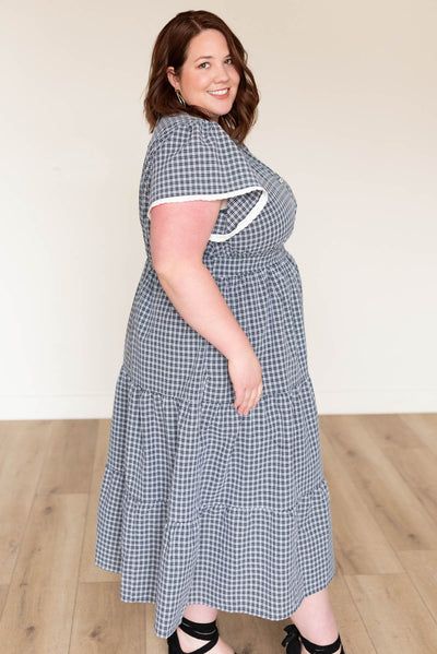 Side view of the black plaid dress in plus size