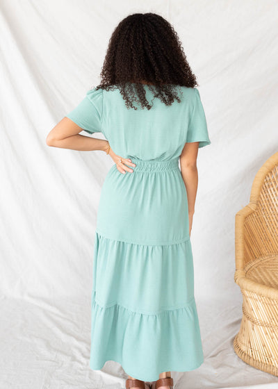 Back view of the sage tiered dress