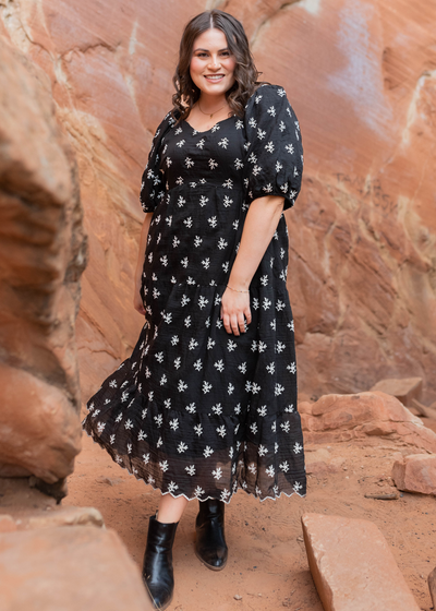 Plus size black floral tiered dress with short sleeves