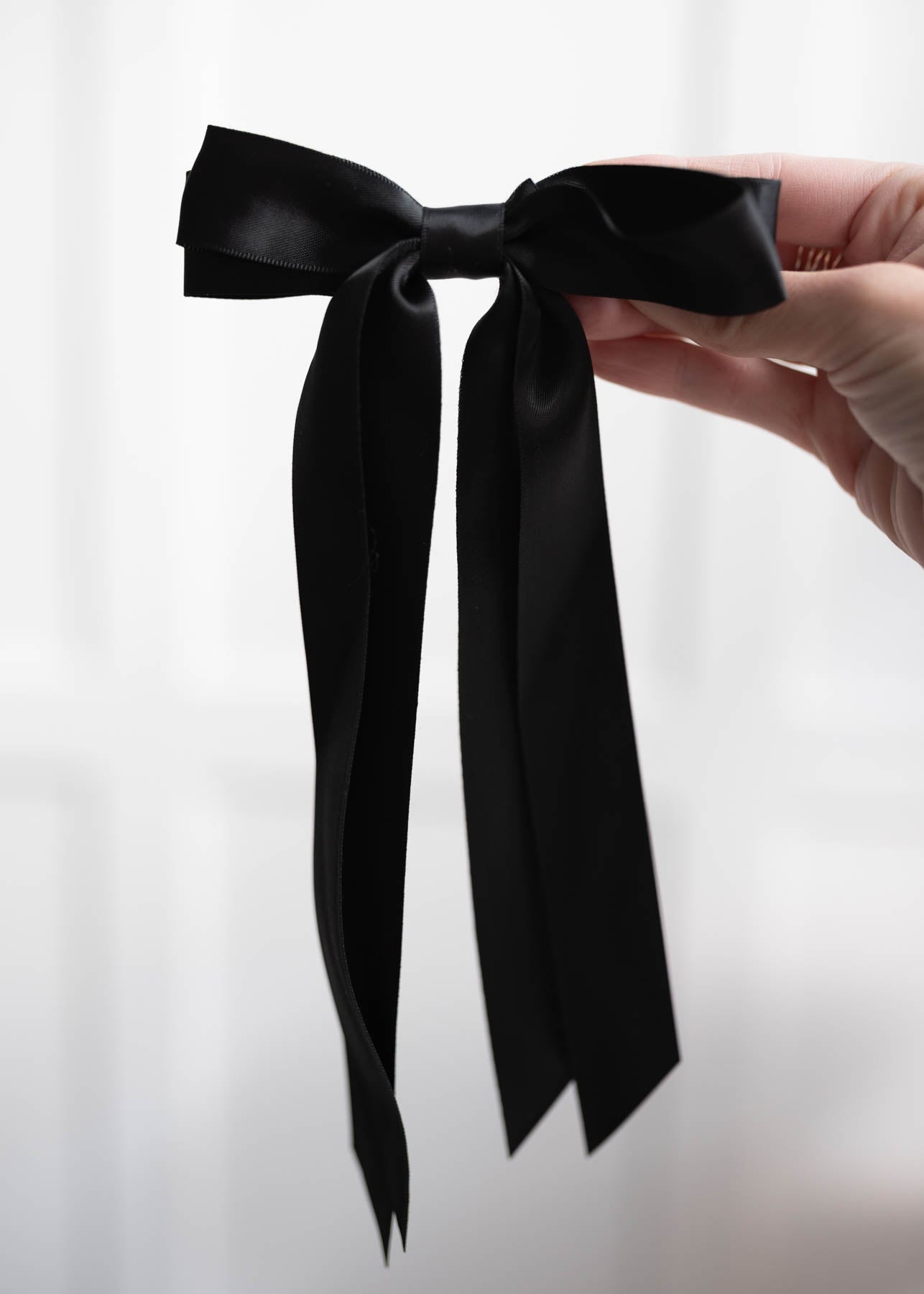 Black double satin bow