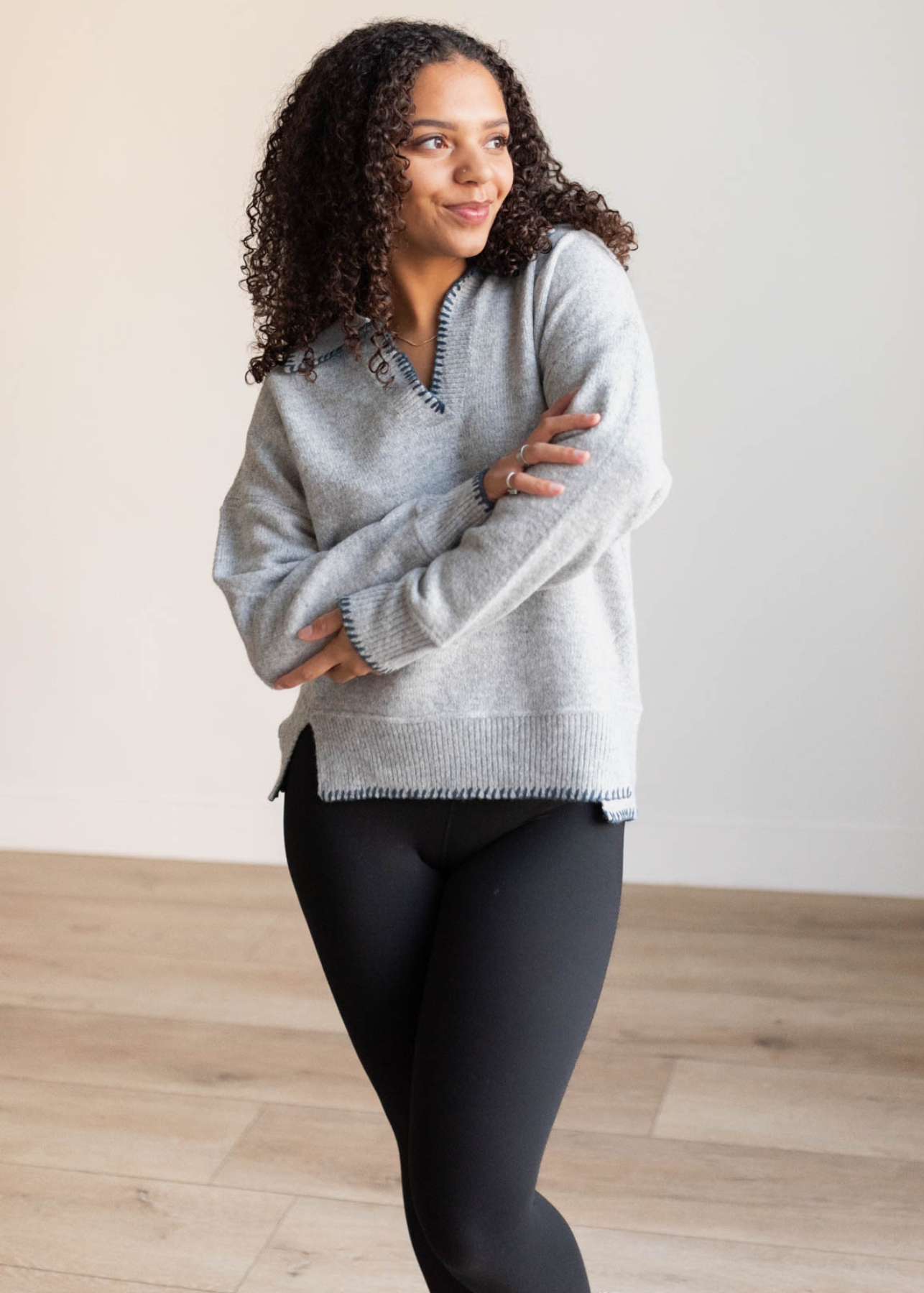 Long sleeve navy stitch knit sweater in grey