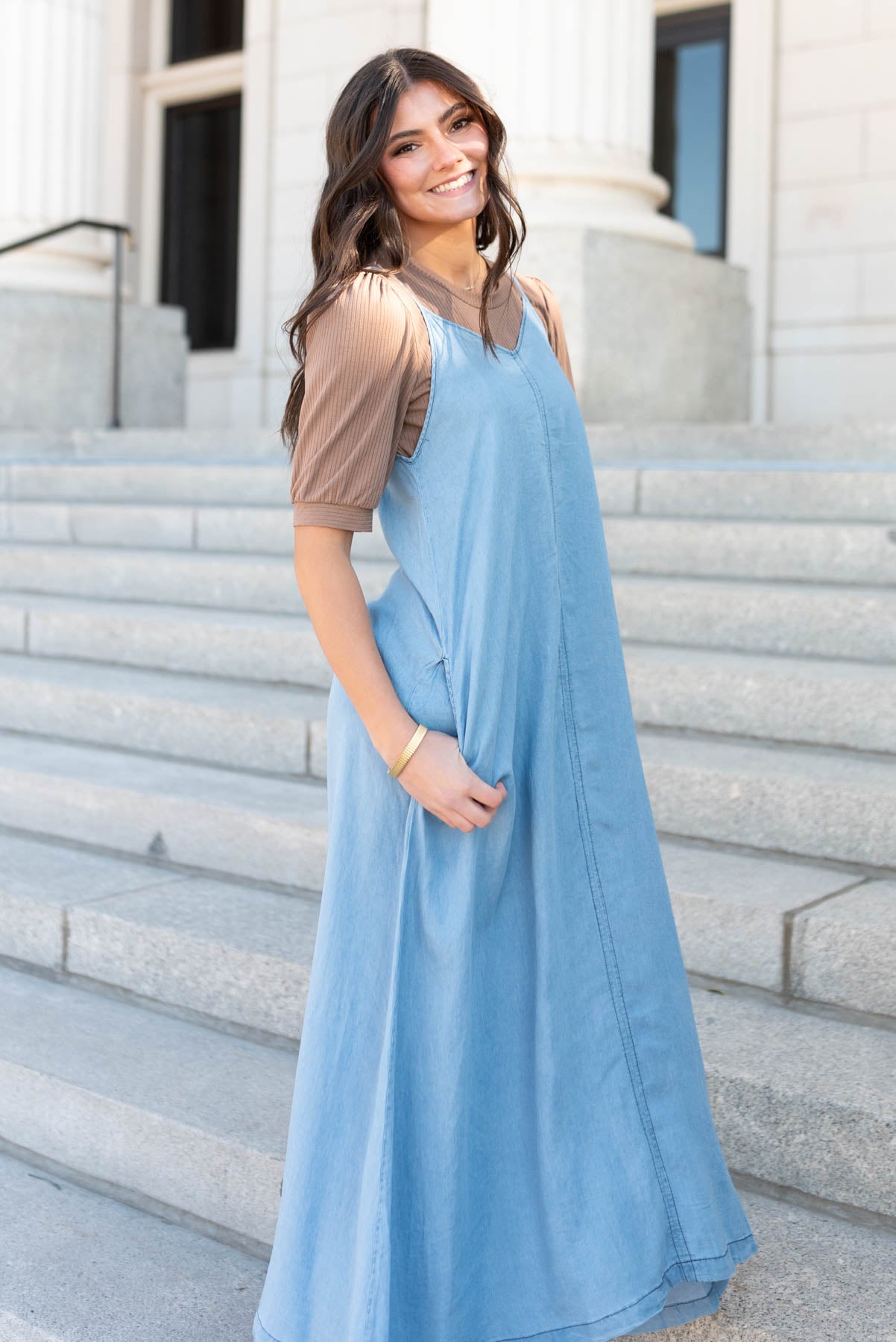 Side view of the denim maxi dress in plus size