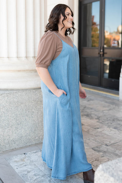 Side view of the plus size denim maxi dress