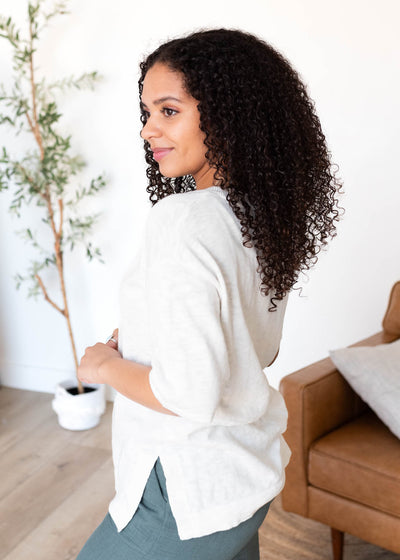 Side view of the white textured top