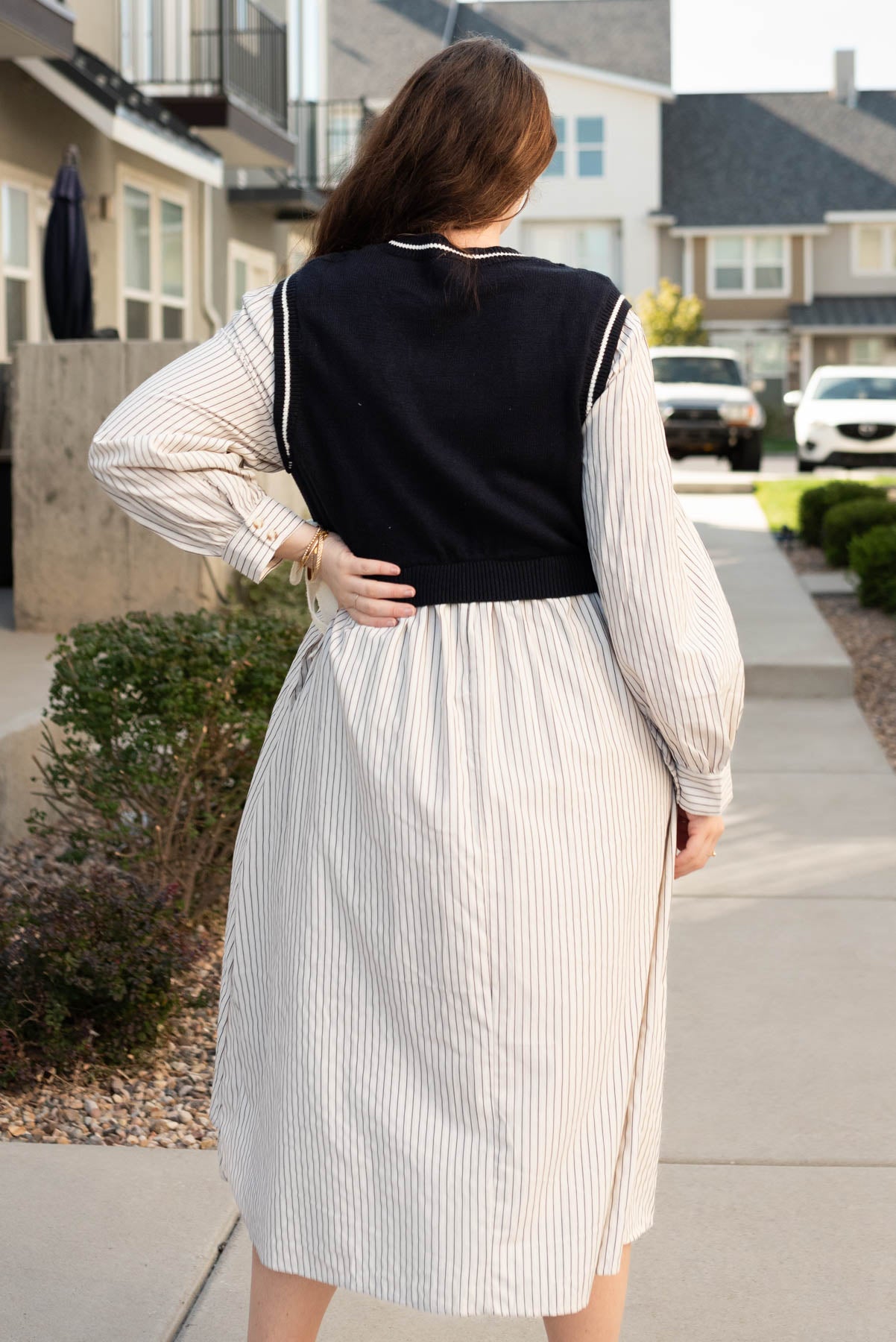 Back view of the plus size navy knit sweater dress in plus size