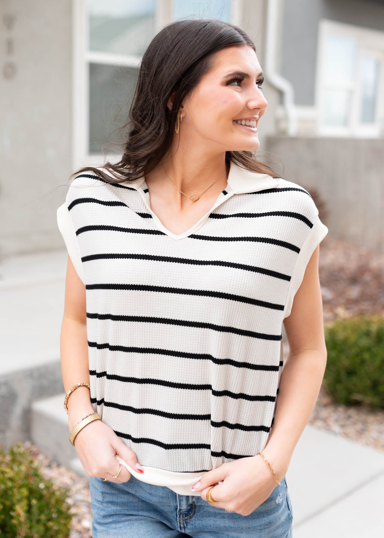 Sleeveless black stripe collared top