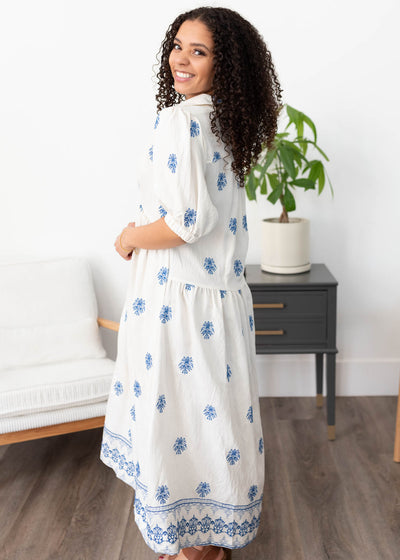 Side view of the cream embroidered dress