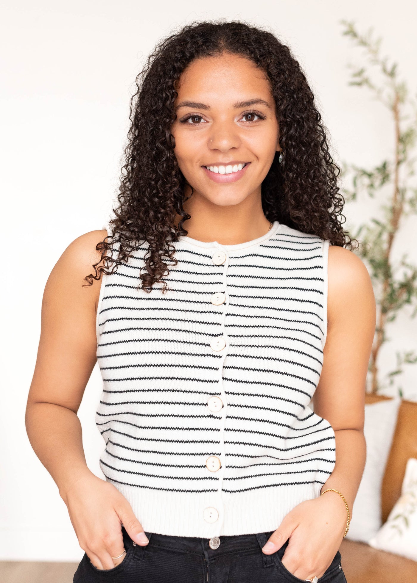 Navy stripe button sweater vest with white buttons