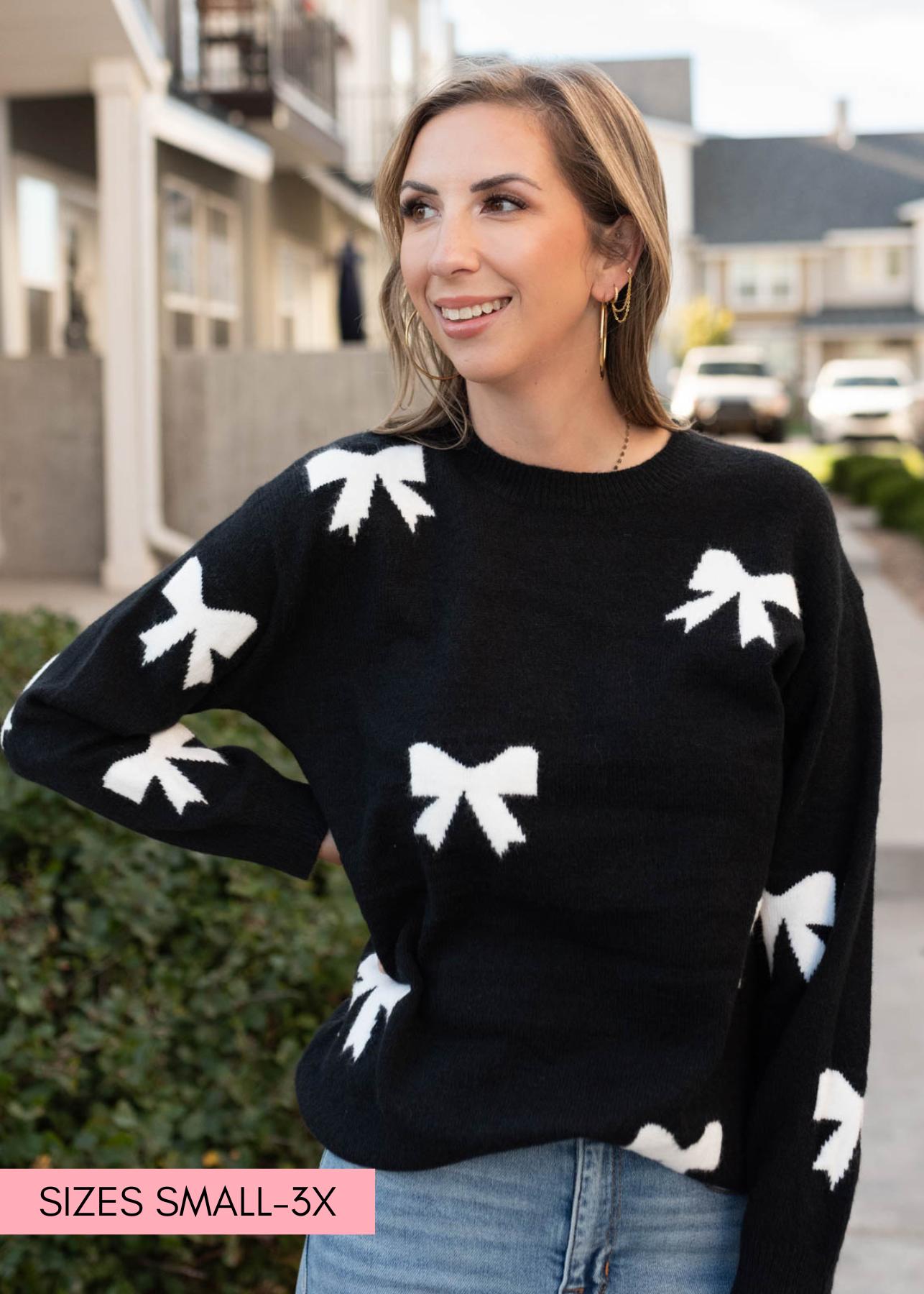 Black bow sweater with long sleeves