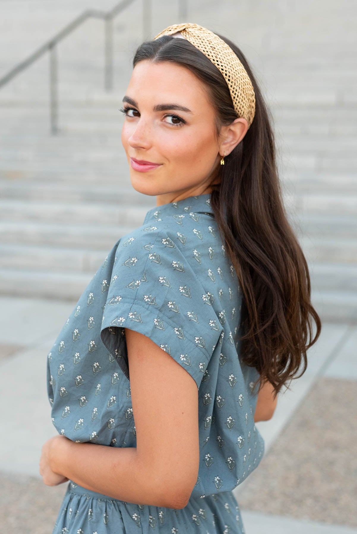 Side view of the steel  blue floral top