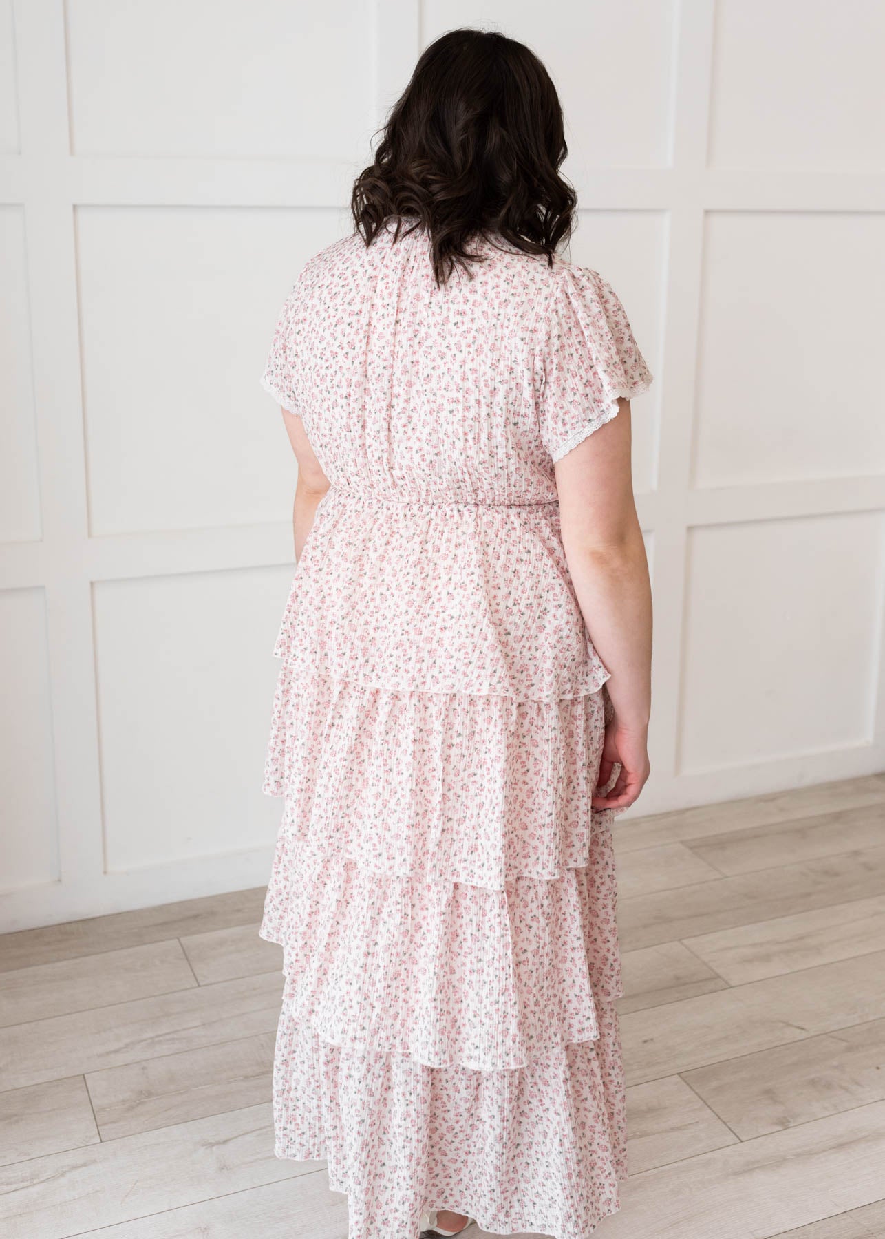 Back view of the plus size blush rose tiered ruffle dress