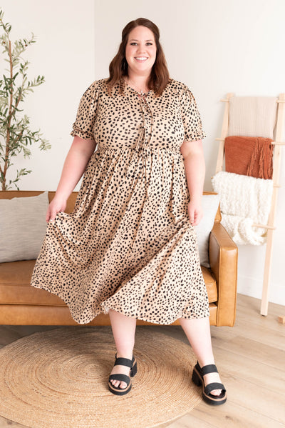 Plus size leopard bow dress with bows on the bodice