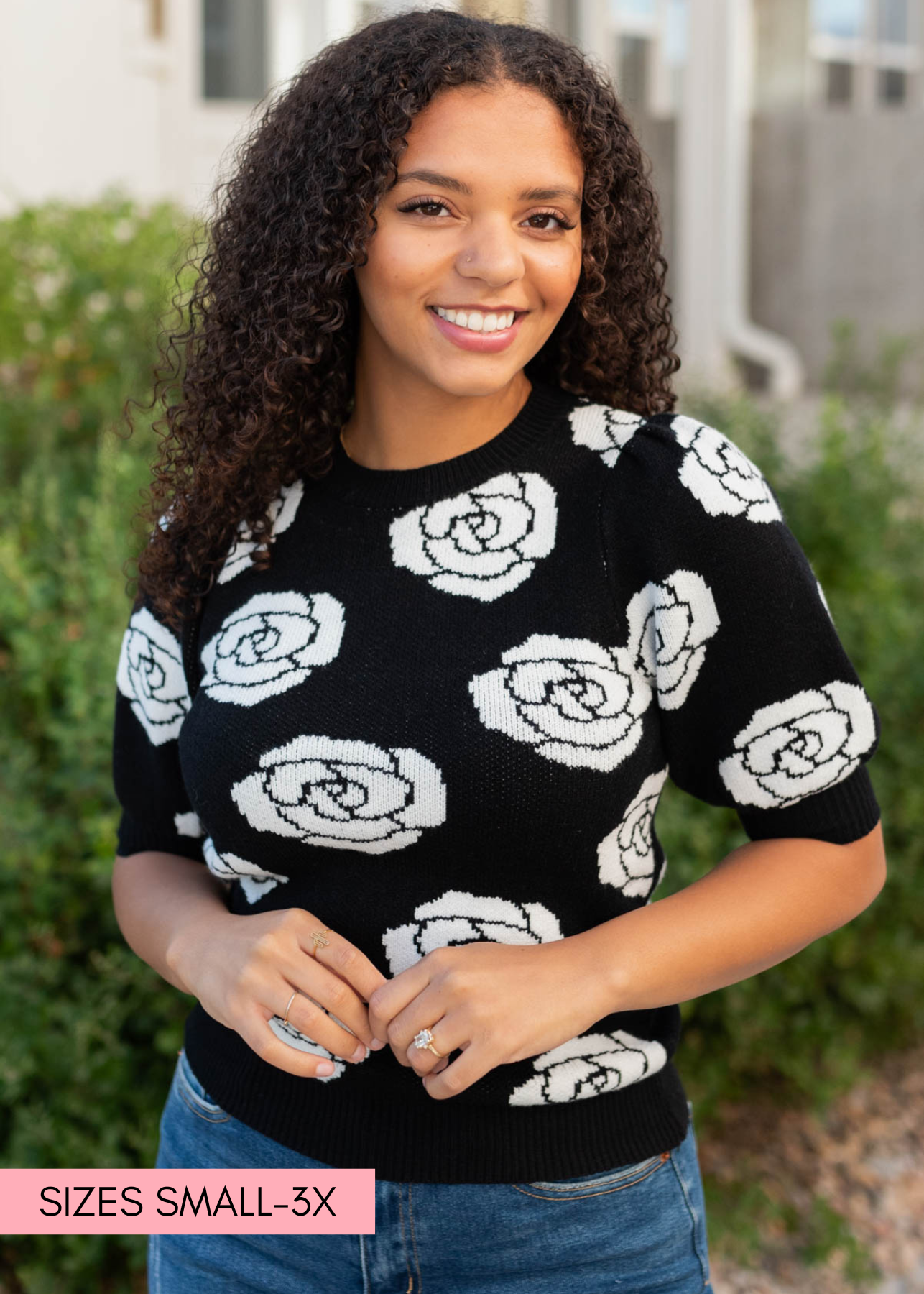 Small black floral print sweater