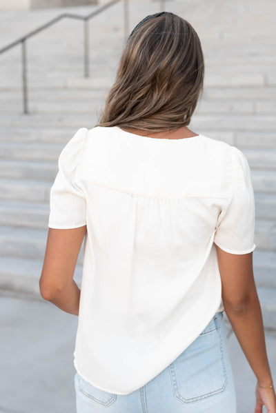 Back view of the ivory button top