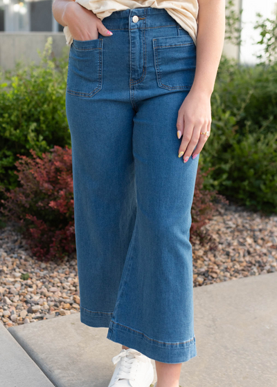Front view of the denim jeans with small front pockets