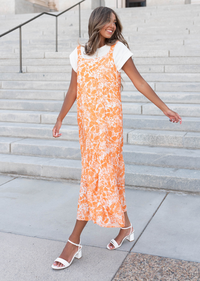 Orange floral strap dress with out sleeves