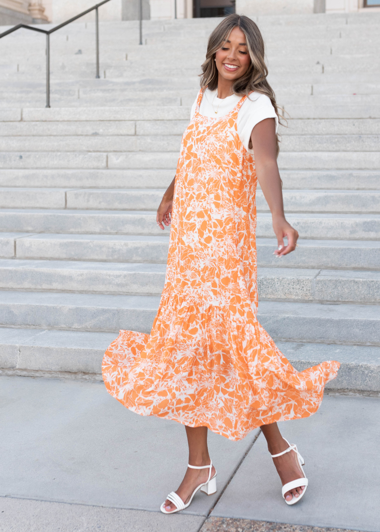 Sleeveless orange floral strap dress