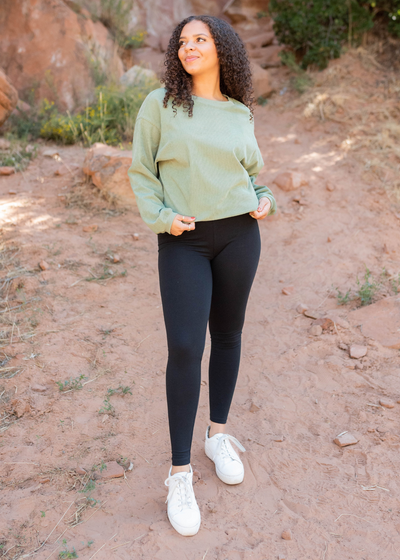 Green ribbed sweatershirt with long sleeves