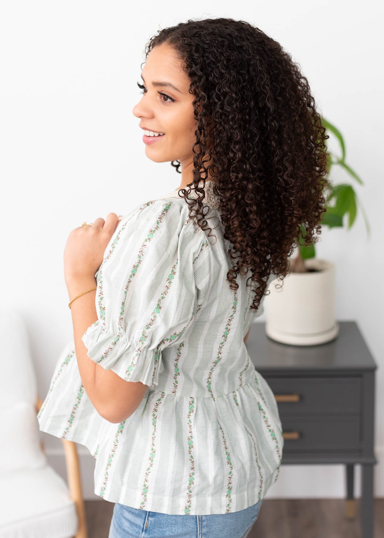 Side view of the green lace top 