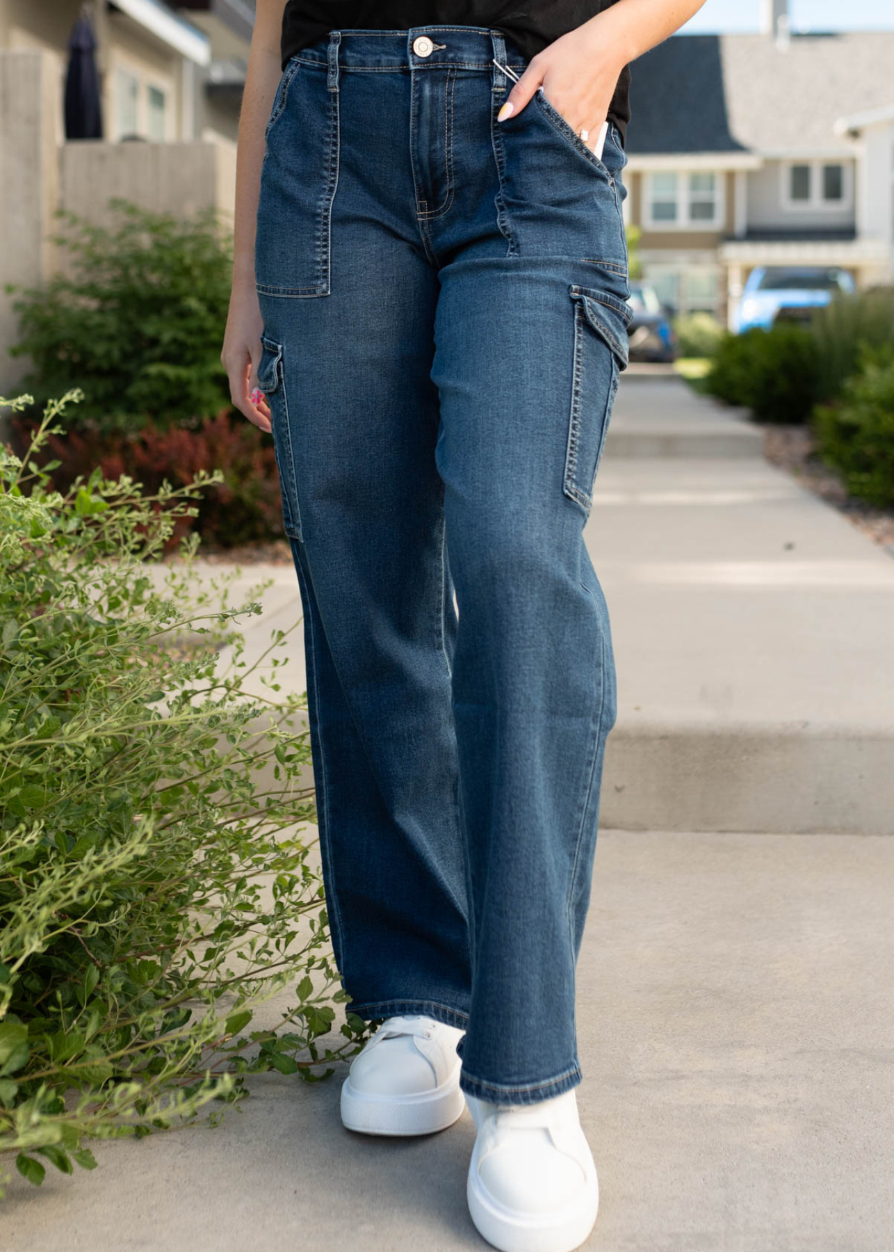 Close up of teh dark wash cargo jeans