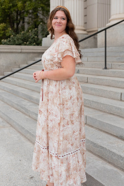 Side view of the plus size burgundy floral lace dress