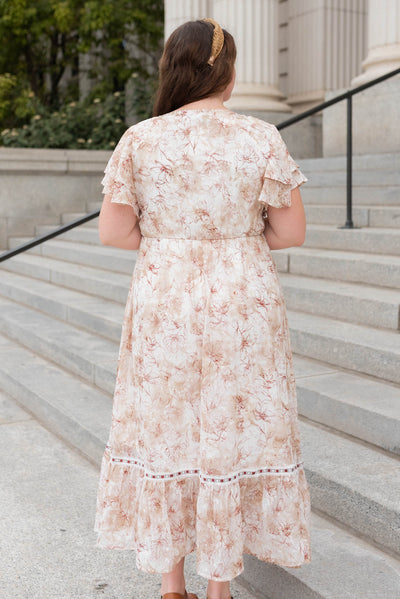 Back view of the plus size burgundy floral lace dress