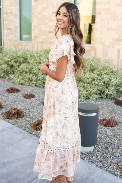 Side view of the burgundy floral lace dress