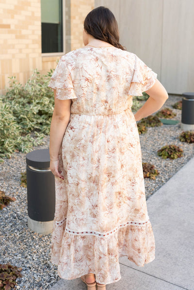 Back view of the burgundy floral lace dress in plus size