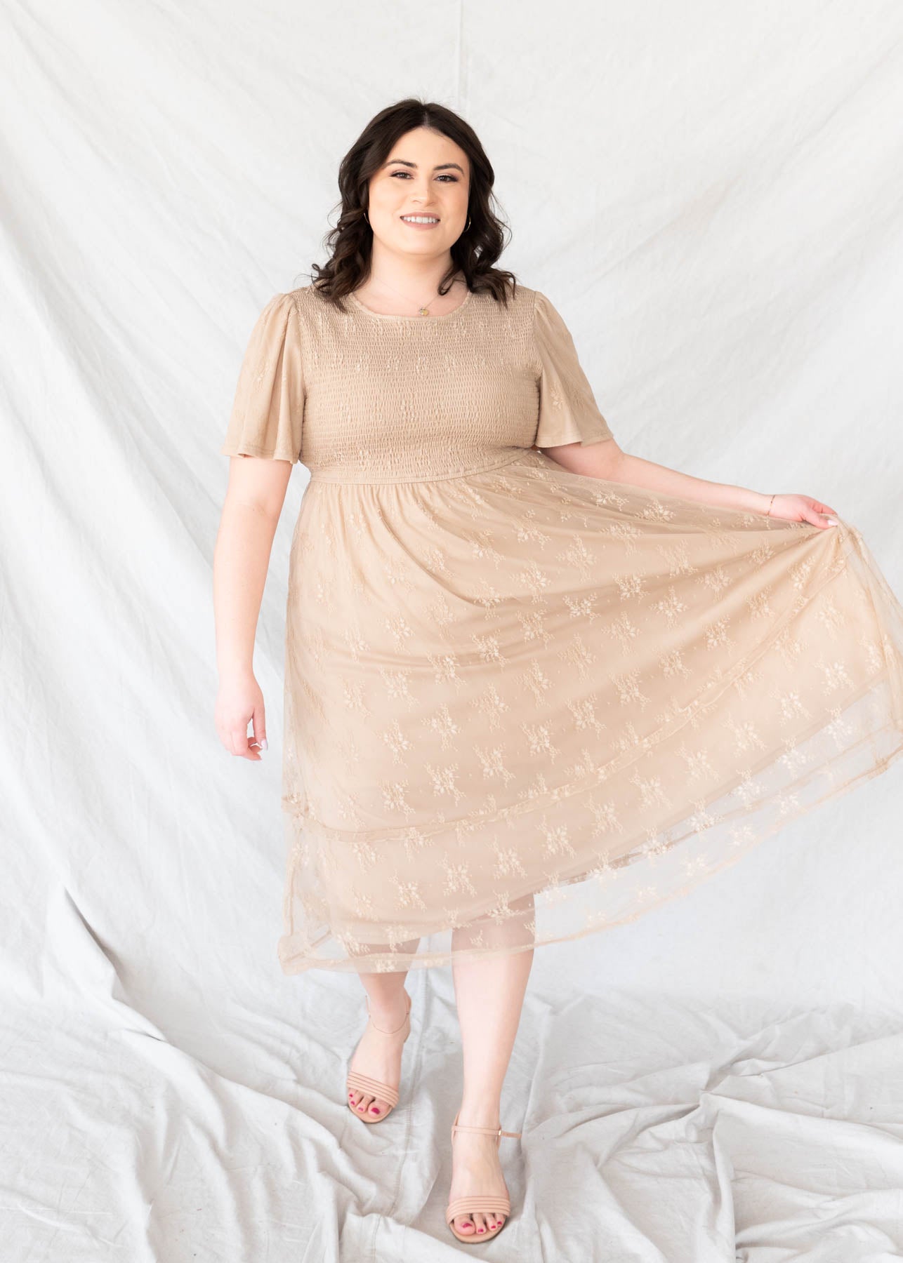 Plus size beige smocked lace dress with round neckline