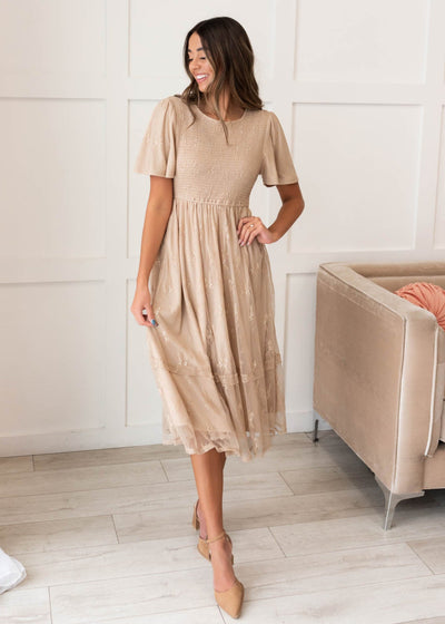 Beige smocked lace dress with scalloped hem