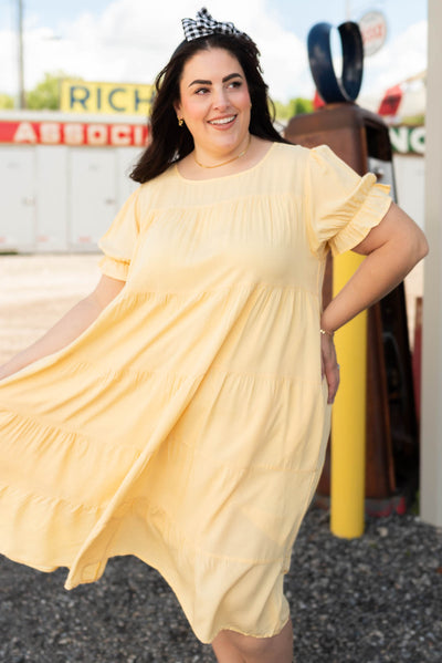 Light yellow tiered dress in plus size