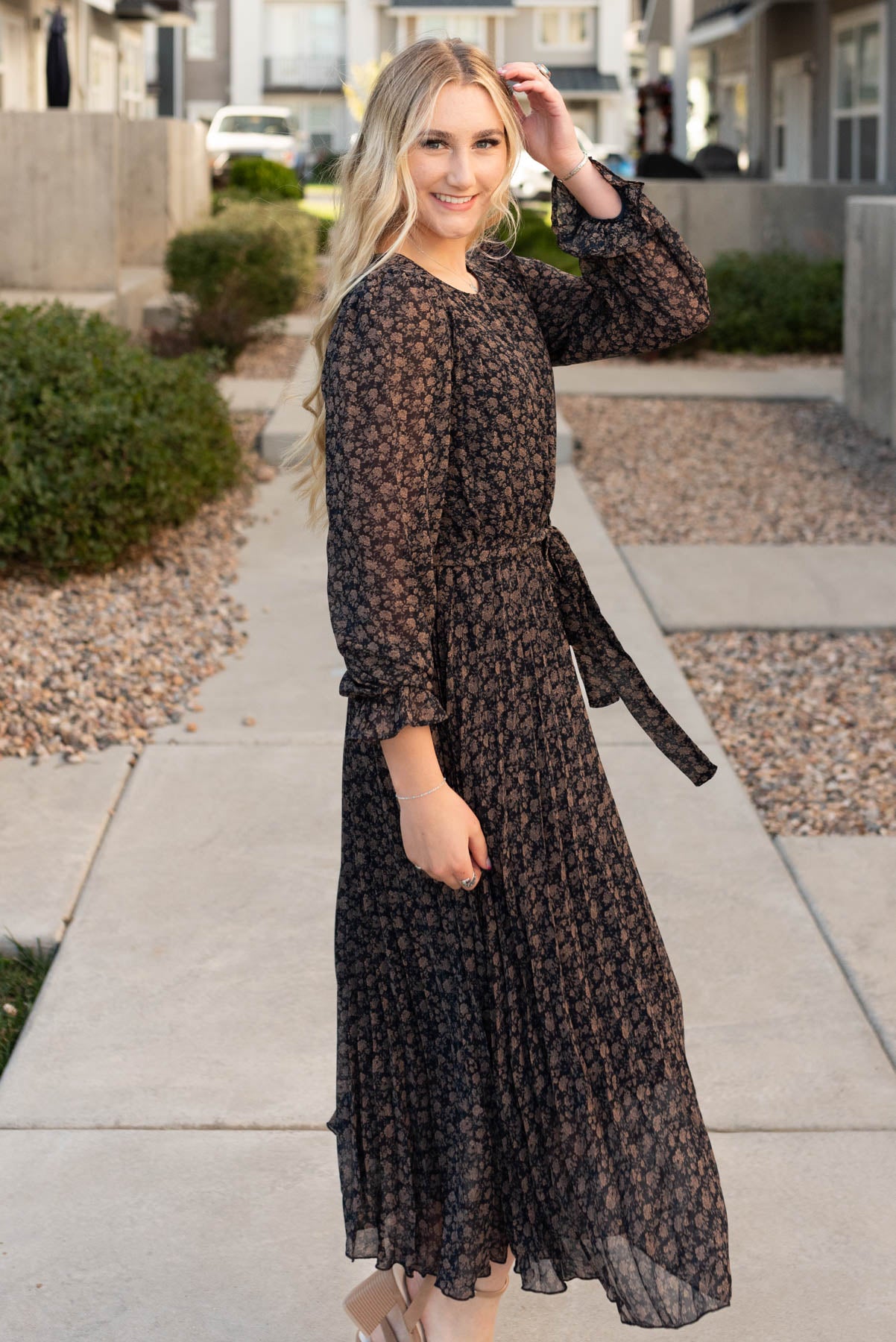 Side view of the navy multi floral dress