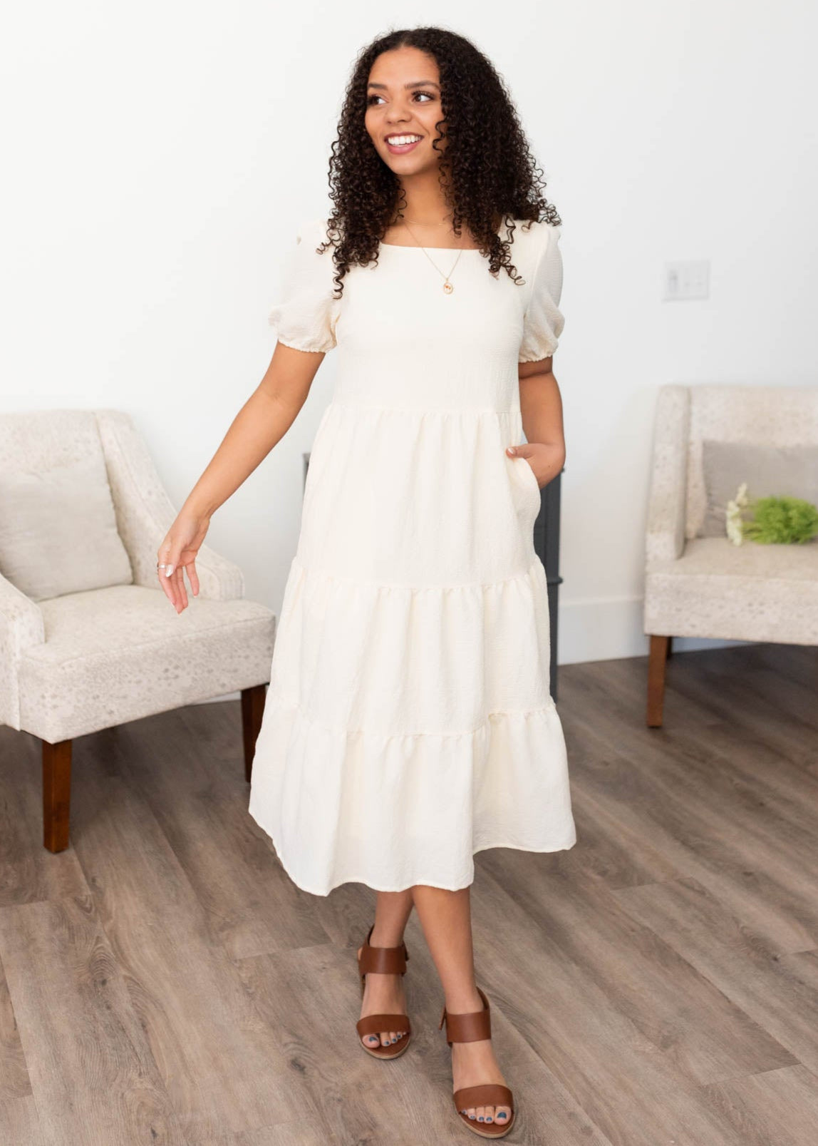 Cream peplum dress with short sleeve and pockets