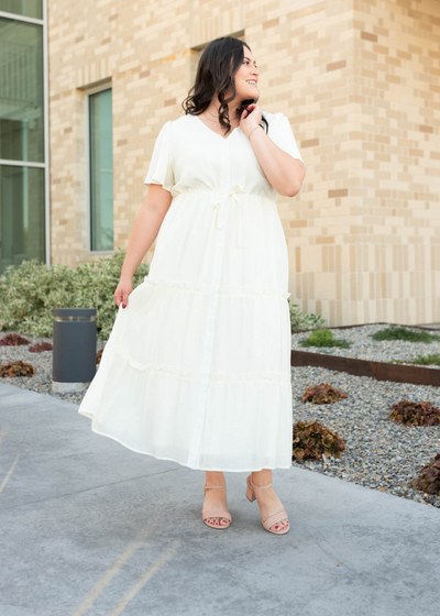 Cream button down dress with a tie at the waist in plus size 