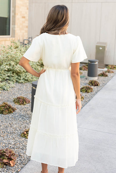 Back view of the cream button down dress