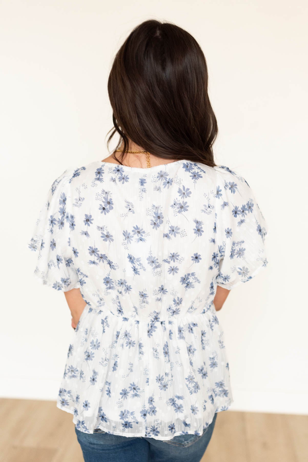 Back view of the blue floral blouse