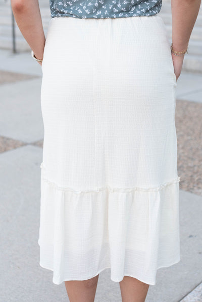 Back view of the ivory textured skirt