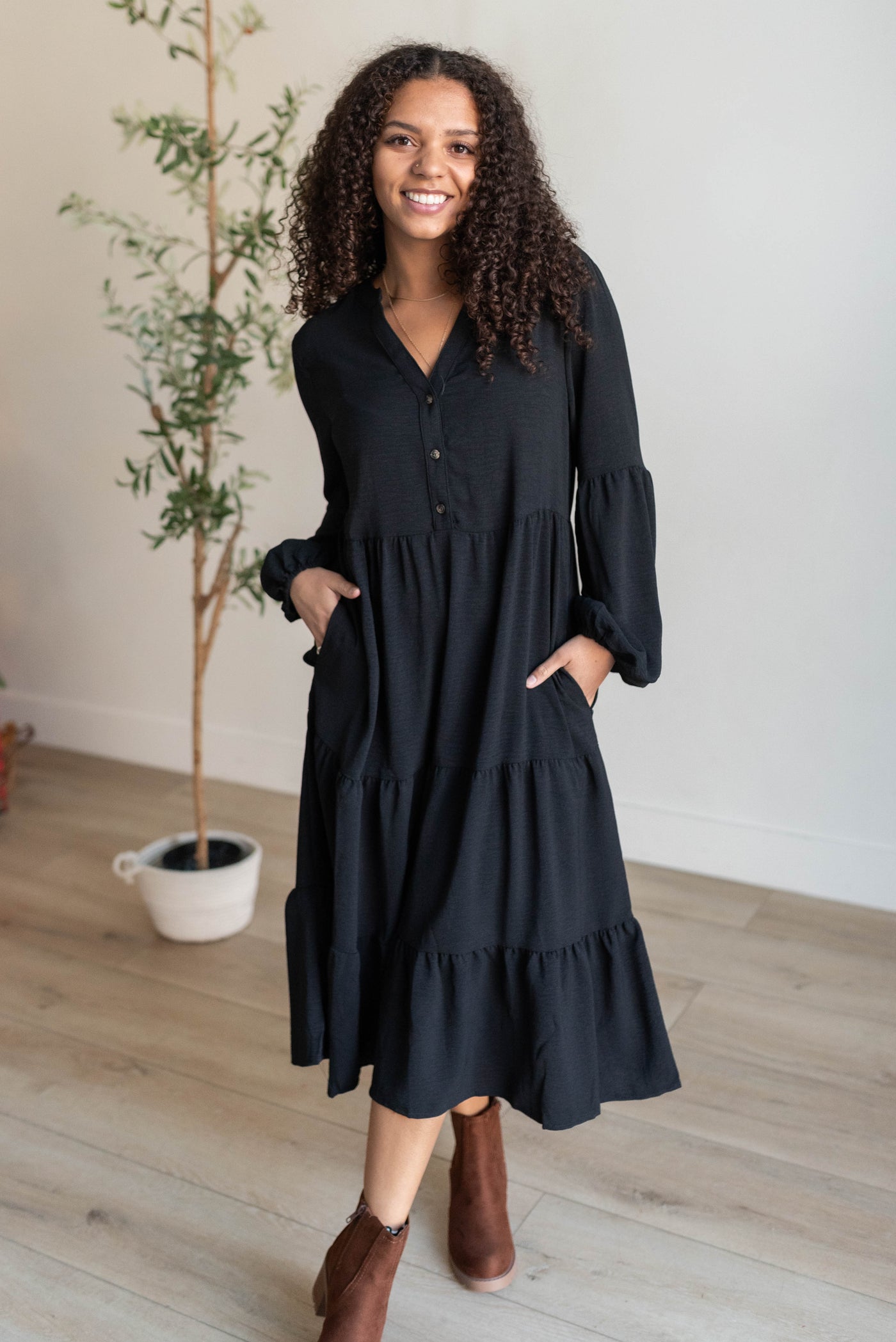 Black tiered dress with a v-neck