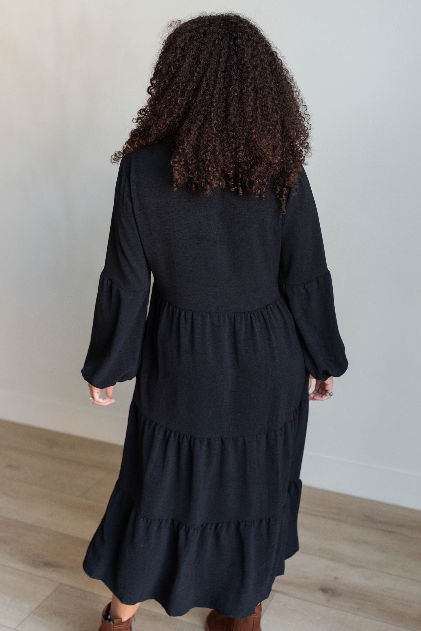 Back view of the black tiered dress