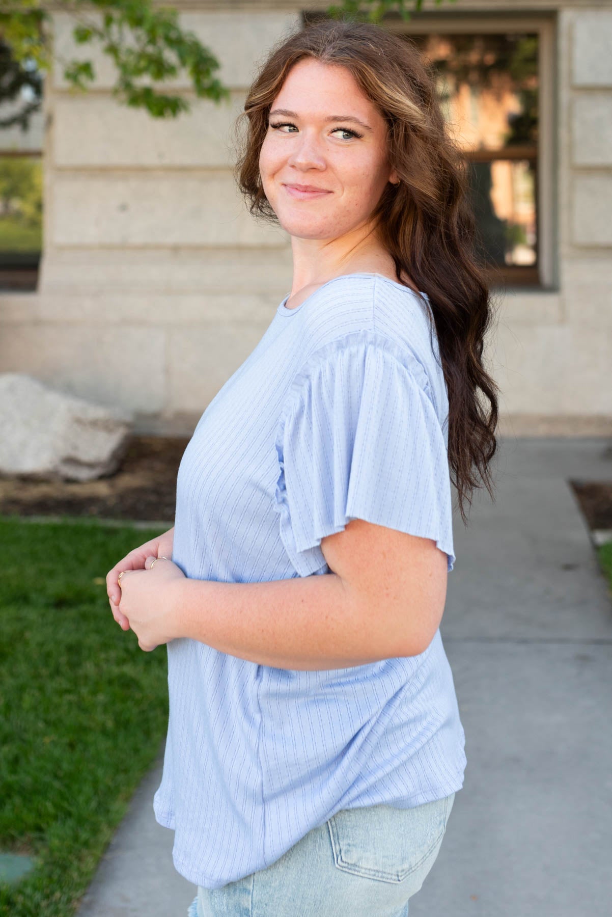 Side view of the light blue textured top