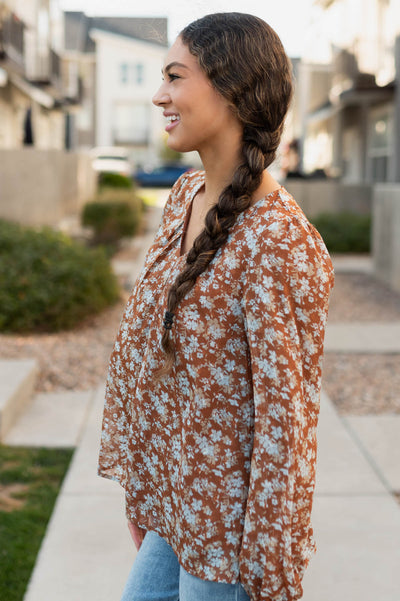 Side view of the blue floral blouse