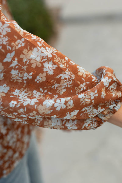 Close up of the fabric on the blue floral blouse