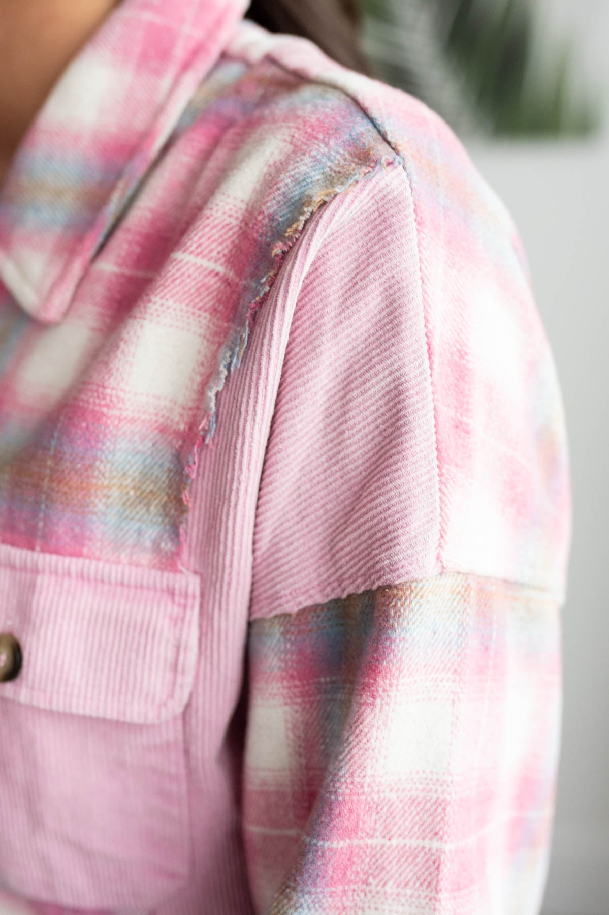 Close up of the two fabrics on the pink plaid shacket