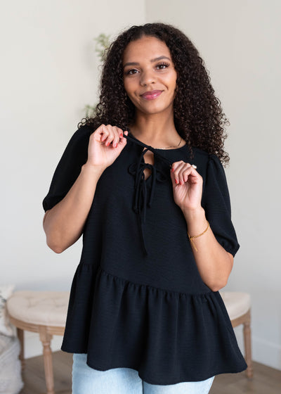 Short sleeve black tiered blouse